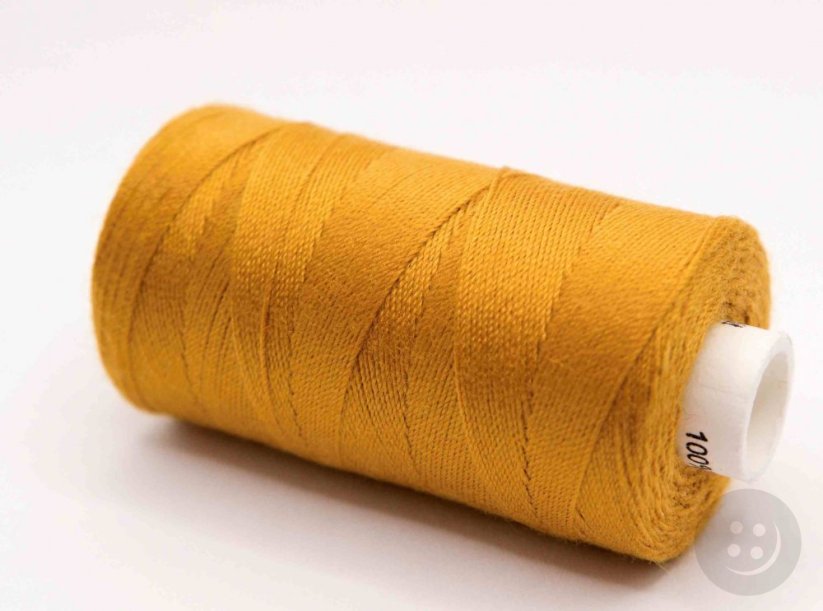 Polyester denim threads in a coil of 200 m - amber