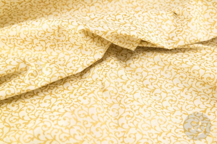 Cotton canvas - gold ornaments on a cream background - width 140 cm
