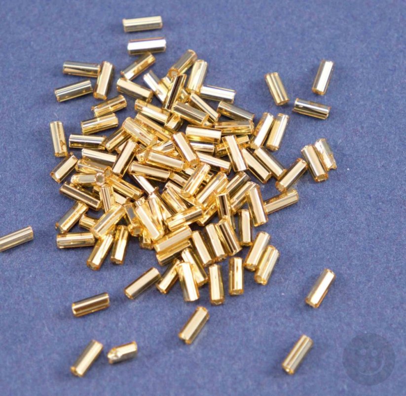 Glass stick shaped beads - gold - length 0,45 cm