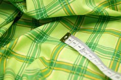 Baumwollleinwand - grüne, gelbe Würfel auf grünem Grund - Breite 140 cm