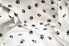 Cotton canvas - black paws on a white background - width 160 cm