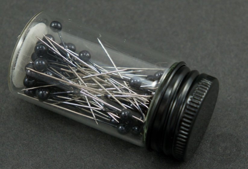 Dekorative Stifte in einer Glasflasche - Schwarzkopf