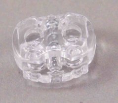 Plastová plochá brzdička - průhledná - průměr průvleku 0,5 cm