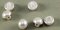 Knoflík ve tvaru perličky se spodním přišitím  - perleťová - průměr 1 cm
