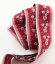 Costume ribbon - red with white flowers - width 3 cm
