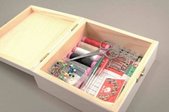 Medium set of sewing supplies in a white wooden box