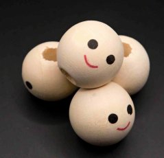Wooden bead with a smile - light wood - diameter 1.8 cm