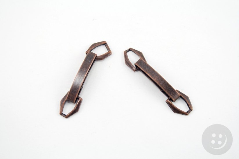 Metal clothing fastening - antique copper - pulling hole width 0,5 cm