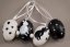 Small easter egg with bunnies on a stick - black, white