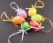 Malé veľkonočné vajíčka s kvietkami na mašličke - žltá, fialová, zelená, červená, oranžová - výška 4 cm