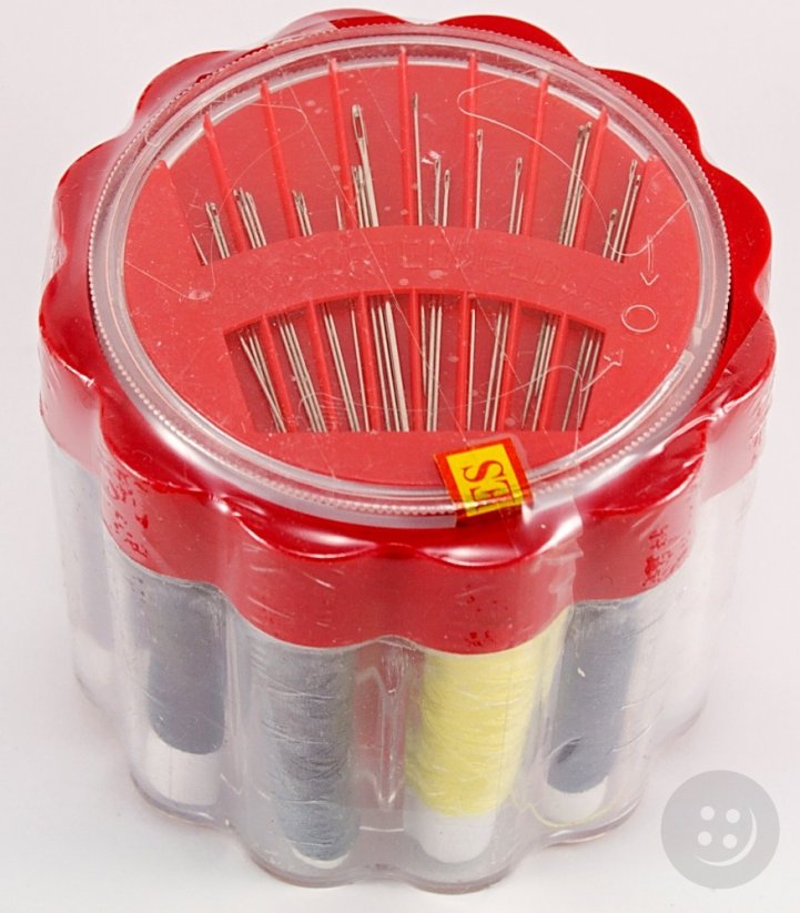 Travel set of sewing supplies in a plastic box