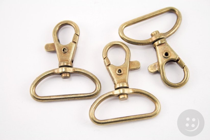 Swivel hook - antique brass - pulling hole width 3 cm :: Sewing