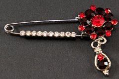 Clothing brooch with red and black crystals - black, red - size 5.5 cm x 4 cm