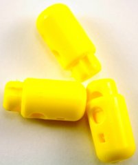 Plastic round cord lock - yellow - pulling hole diameter 0.5 cm