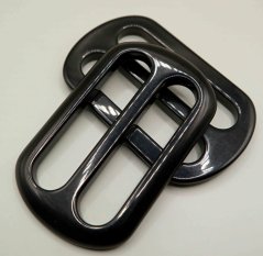 Rechteckige Klebebandklemme aus Kunststoff - glänzend schwarz - Loch 6 cm