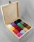 A mixture of Pearl embriodery yarns in a box made of pine wood