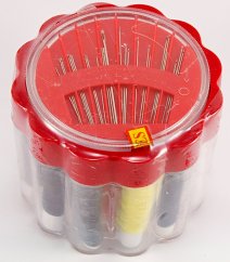 Travel set of sewing supplies in a plastic box