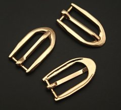 Gold metal buckle with prong