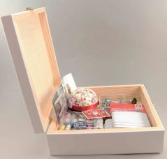 Big set of sewing supplies in a white wooden box