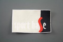 Sew-on patch Sport Base - black, ecru, white, red - dimensions 5,3 cm x 3 cm