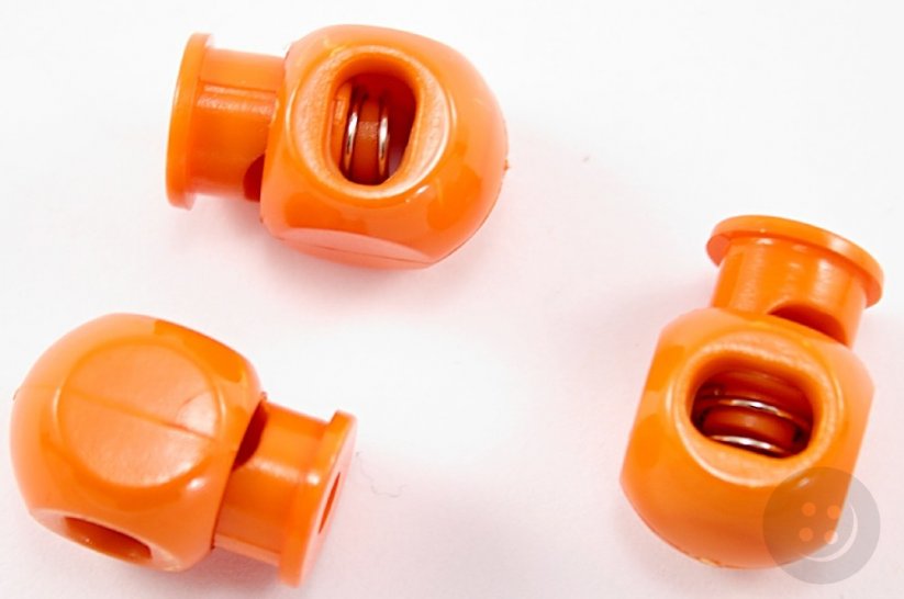 Plastová guľatá brzdička - oranžová - priemer prievlaku 0,9 cm