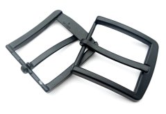 Rounded black metal belt buckle with prong