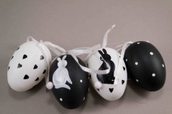 Big easter egg with bunnies on a bow - black, white