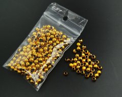 Zlaté pokovené korálky o průměru 0,4 cm