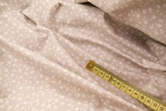 Baumwollstoff - weiße Blümchen auf beigem Untergrund - Breite 160 cm