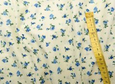 Bavlněné plátno - směs modrých kvítků na smetanovém podkladu