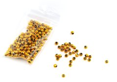 Zlaté pokovené korálky o průměru 0,4 cm