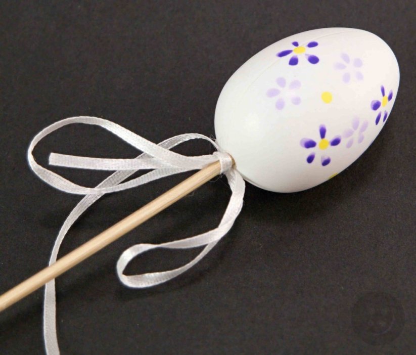 Eggs with flowers on a stick - purple, green, orange