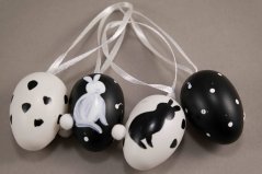 Kleines Osterei mit Hasen auf einer Schleife - schwarz, weiß