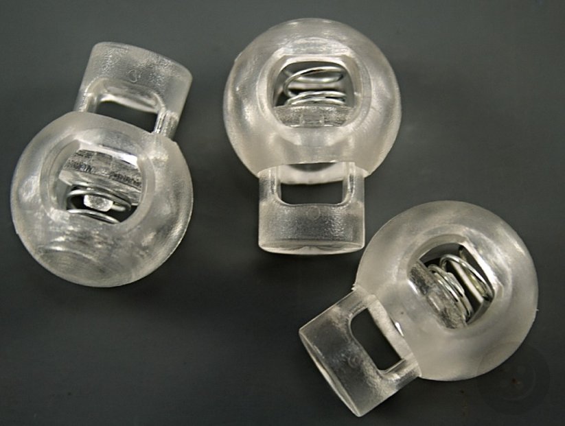 Plastic round cord lock - transparent - pulling hole diameter 0.5 cm