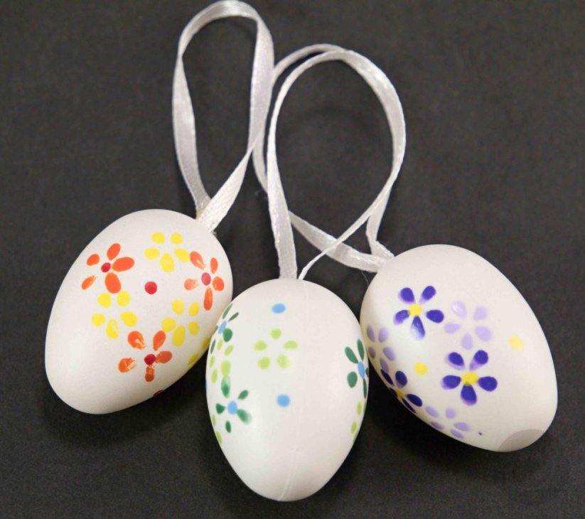 Easter eggs with flowers and bow - purple, green, yellow