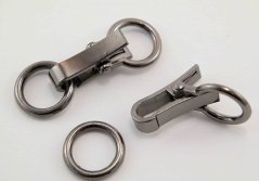 Kovové oděvní zapínání - tmavě stříbrná - rozměry 2,1 cm x 6 cm