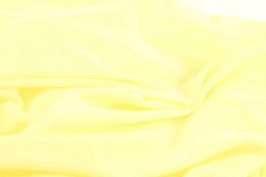 Pružná úpletová podšívka citrónová
