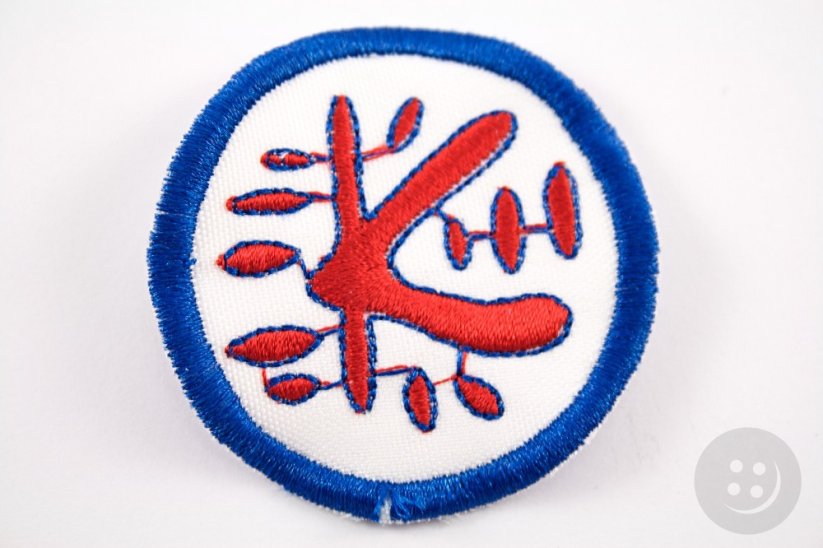 Sew-on patch with embroidered letter K - blue, red, white - diameter 5 cm