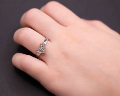 Children's silver ring with an asymmetrical heart