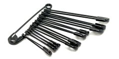 A mixture of large black safety pins